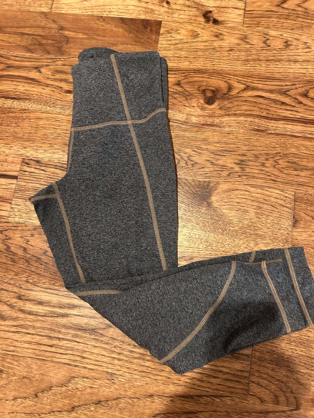 Athleta Dark Gray Leggings with Tan Contrast Stitching